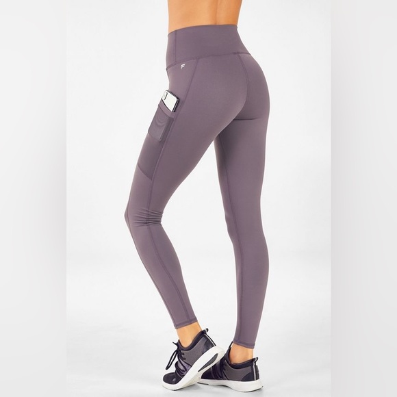 Fabletics Pants - FABLETICS purelux high waisted sidepockets shine 7/8 leggings metallic purple  M